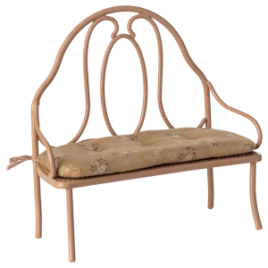 Banc vintage rose foncé avec coussin pour lapins et souris