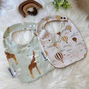 Bavoirs Pression Motifs Girafes et Montgolfières étoilées